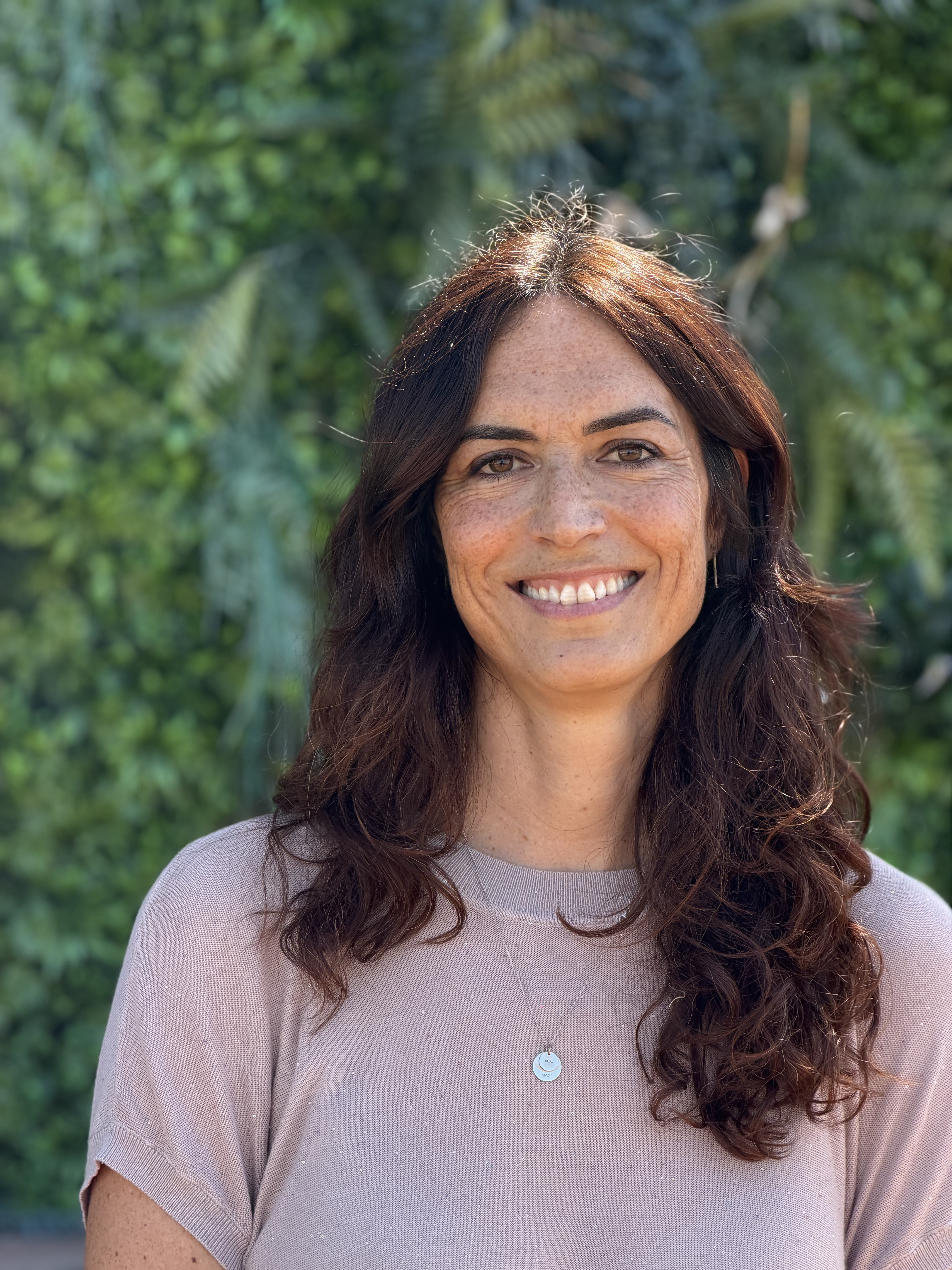 a person smiling for a picture