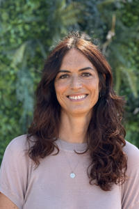 a person smiling for a picture