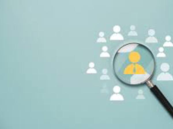 a magnifying glass over a group of people