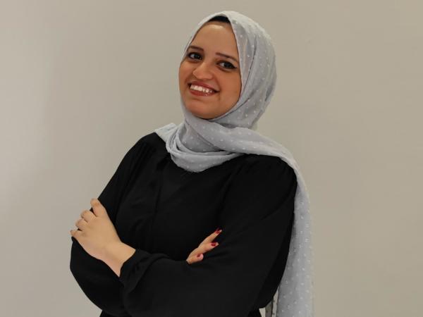 a person with a scarf on her head