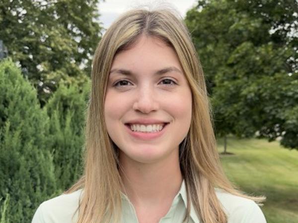 a person smiling at camera