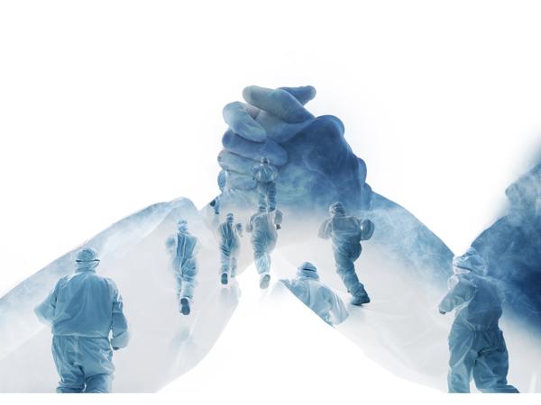 a group of people in protective suits