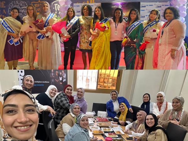 a group of women posing for a photo
