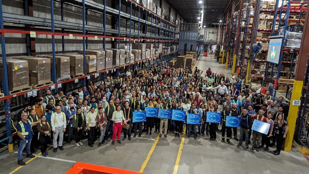 a group of people in a warehouse