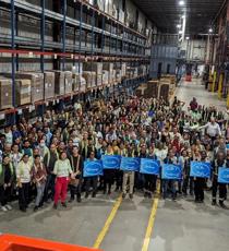 a group of people in a warehouse