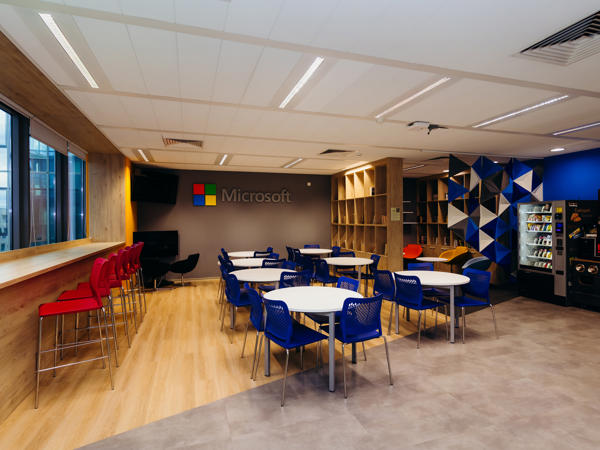 a room with tables and chairs
