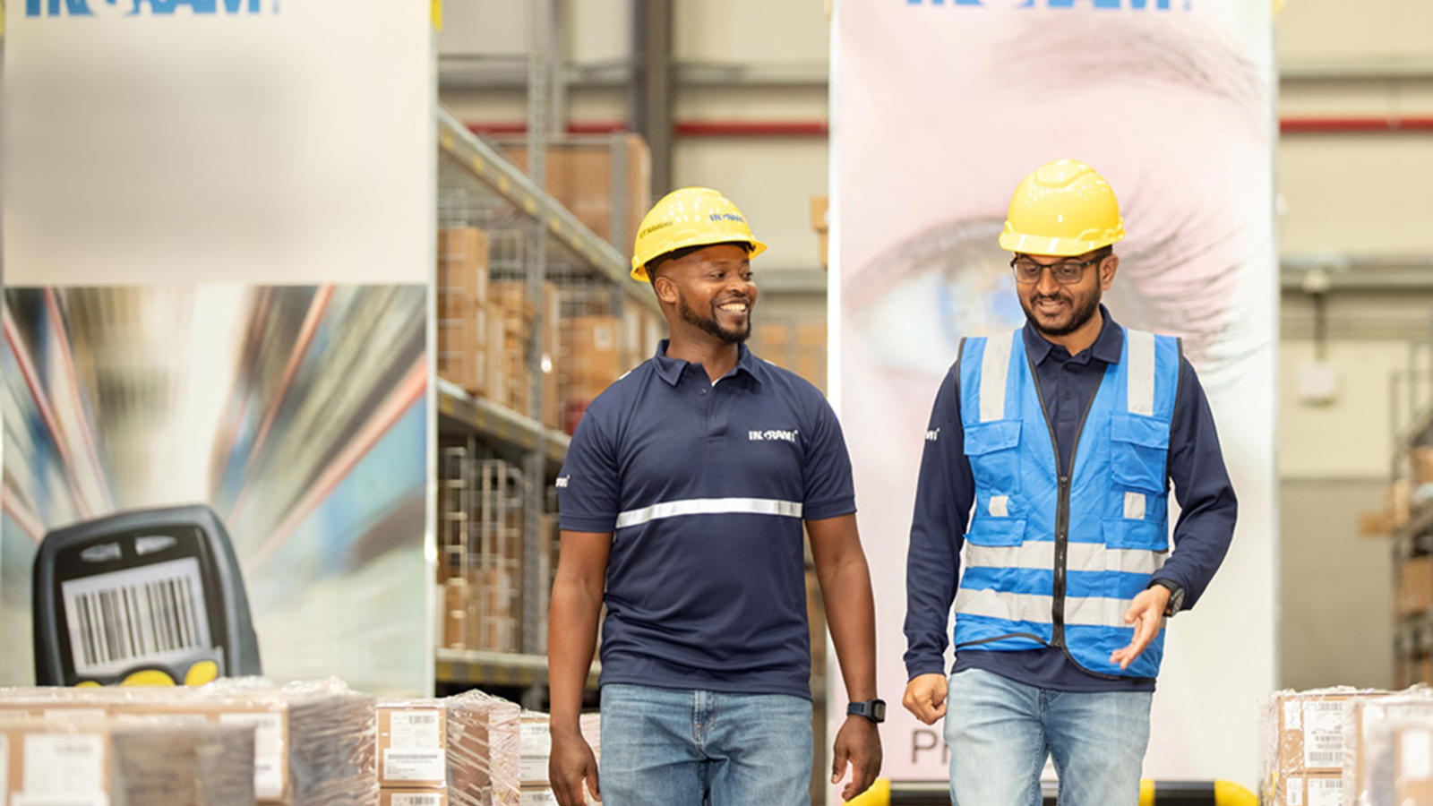 a group of men in a warehouse