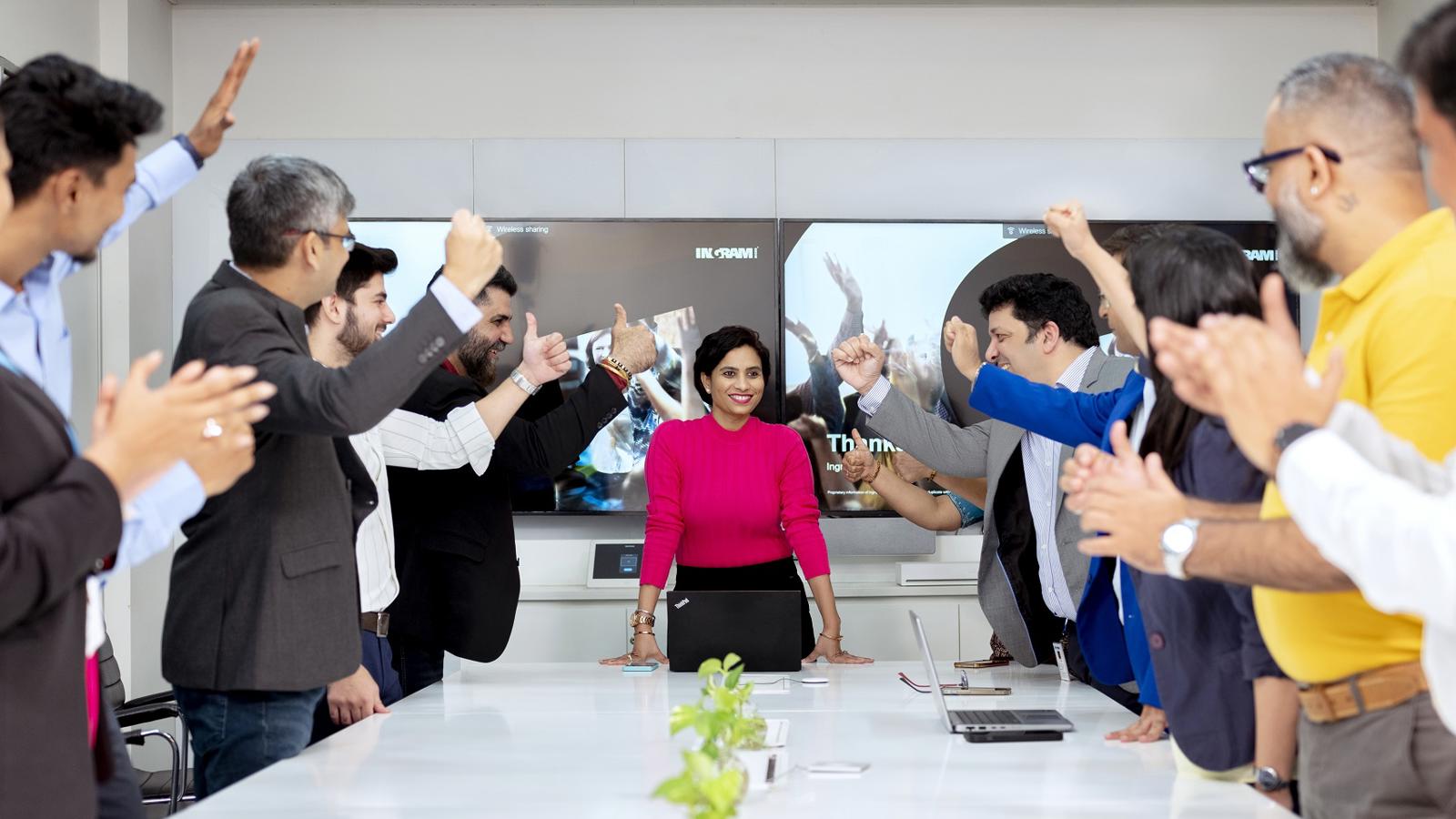 a group of people raising their hands