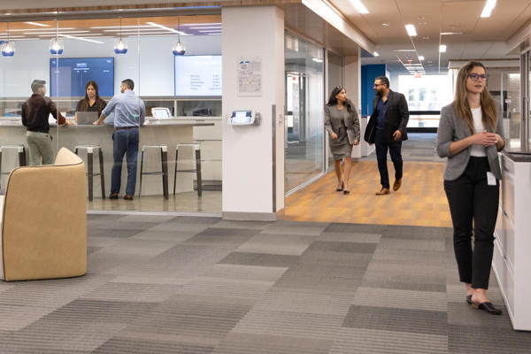 people in a building with people walking around