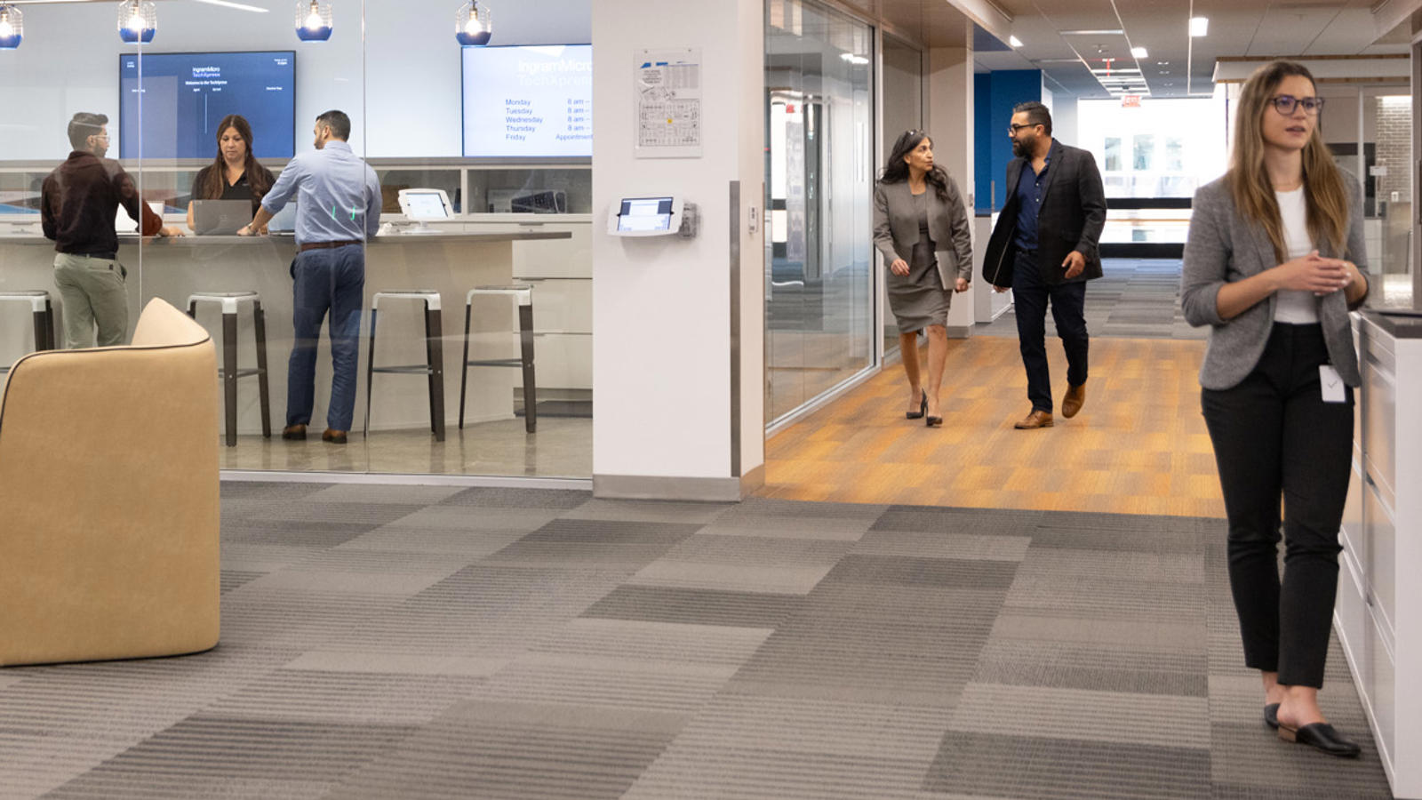 people in a building with people walking around