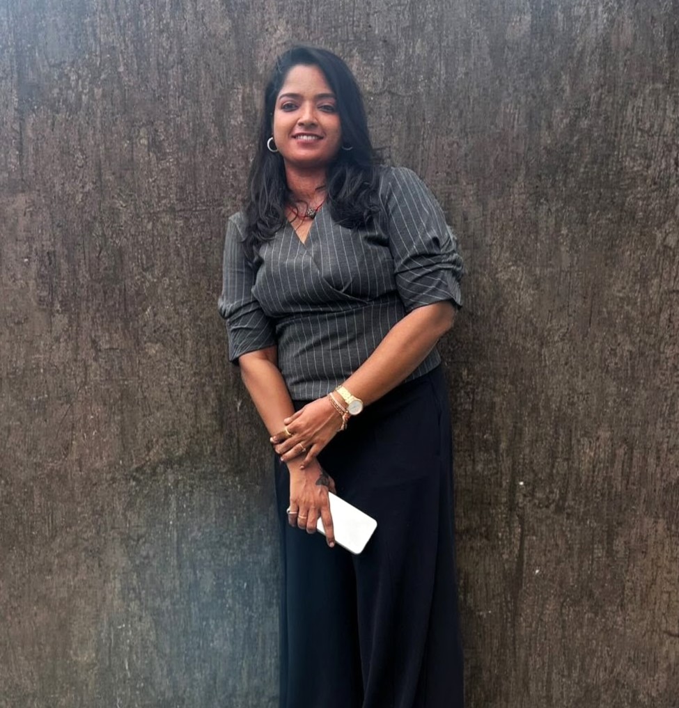 a person leaning against a wall