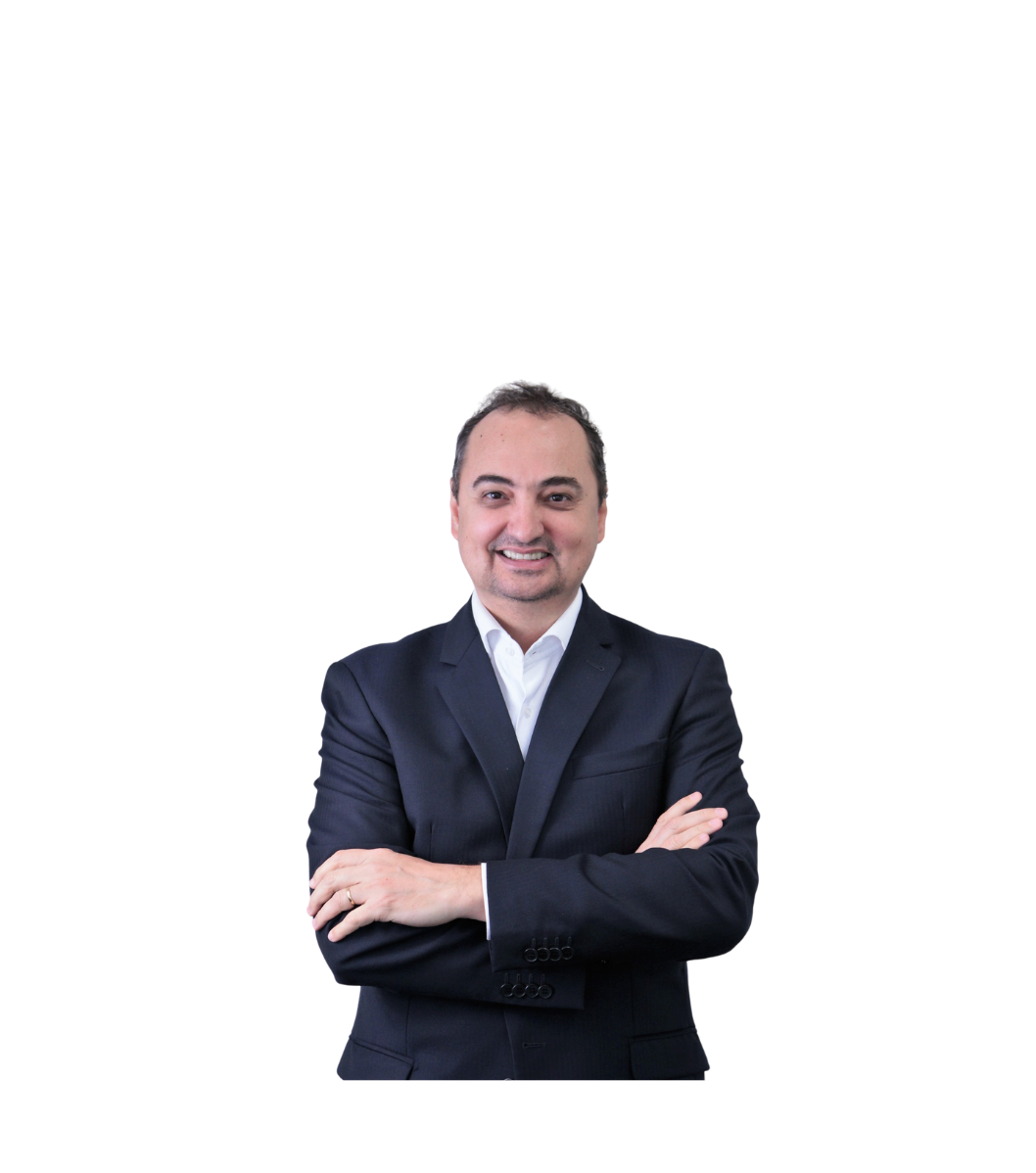 a person in a suit with his arms crossed