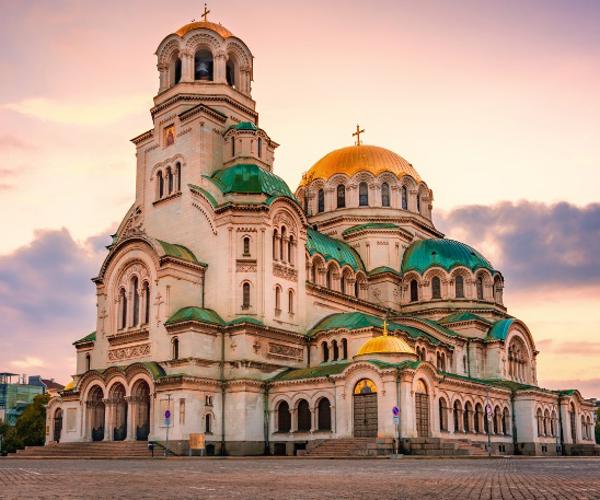a large building with a large dome and a cross on top