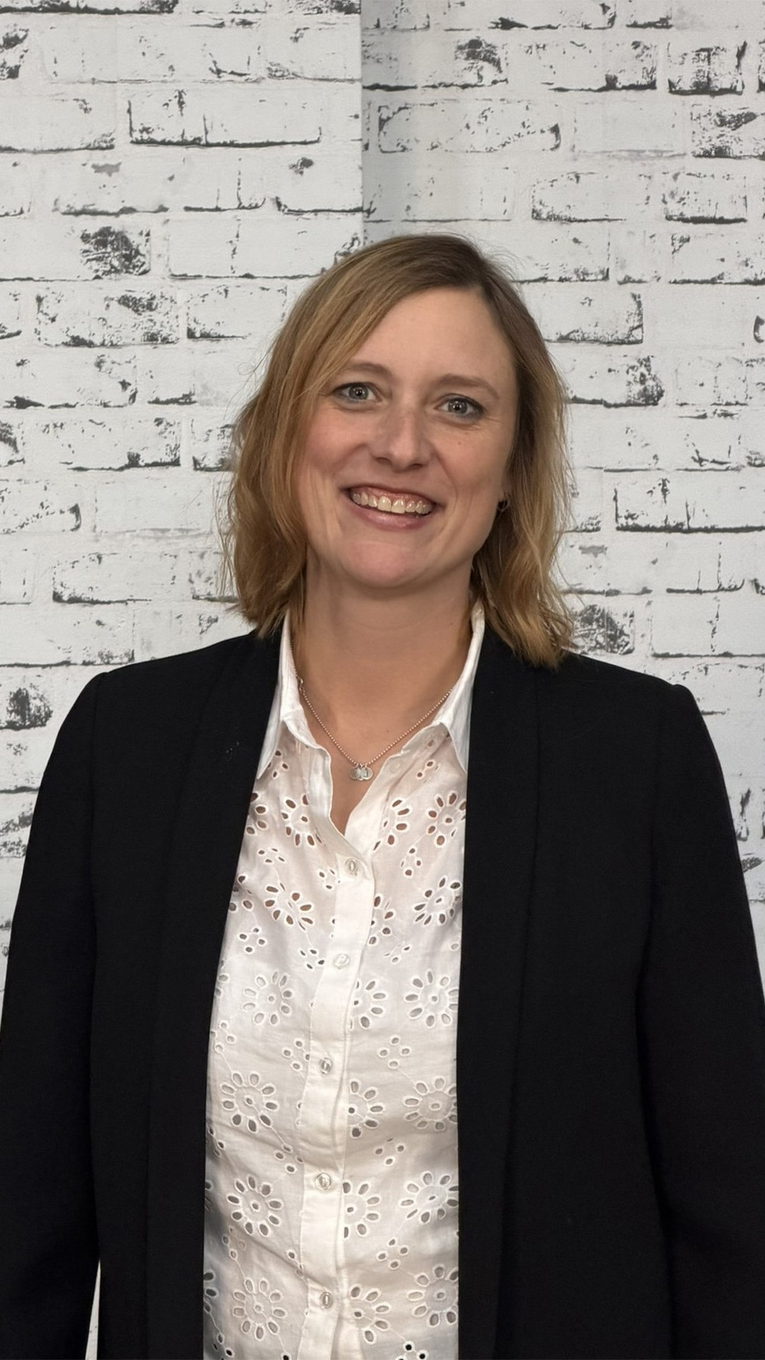 a person smiling at camera