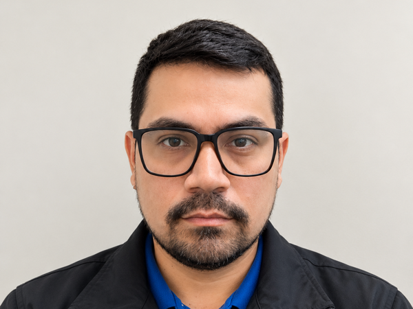a person with glasses and a beard