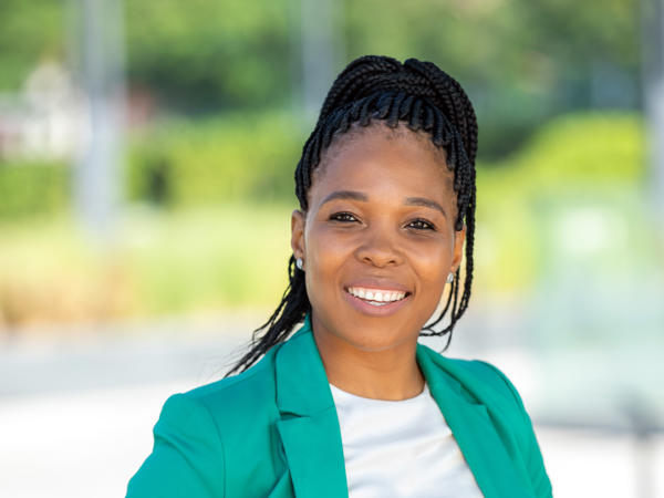 a person in a green jacket
