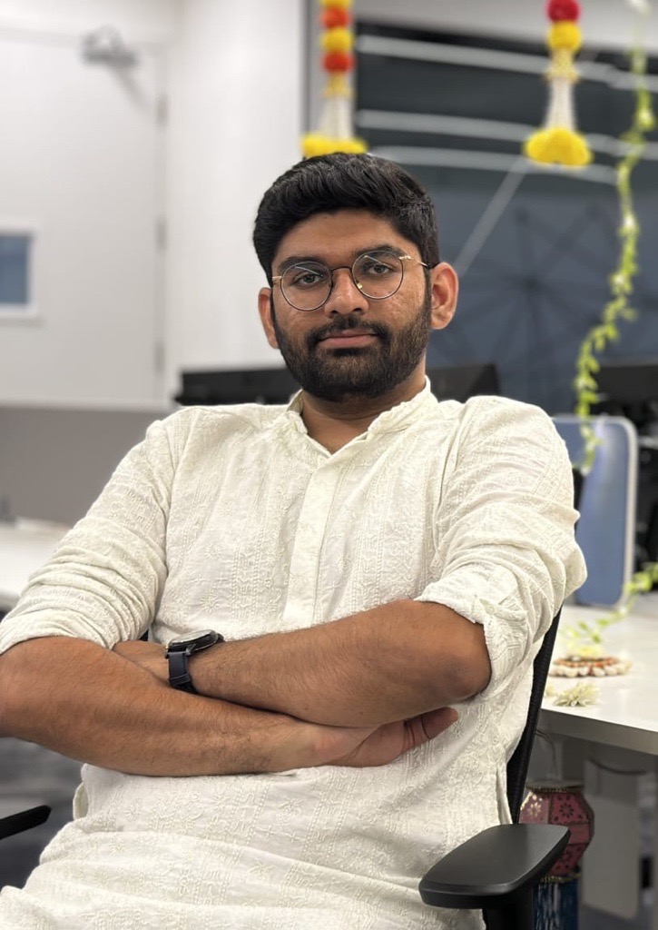 a person with glasses and a beard