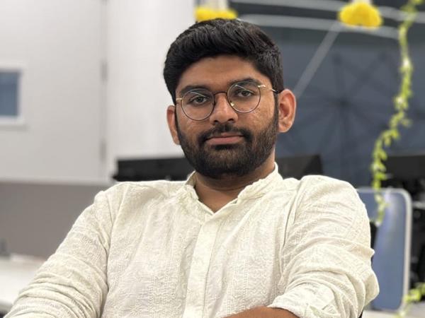 a person with glasses and a beard