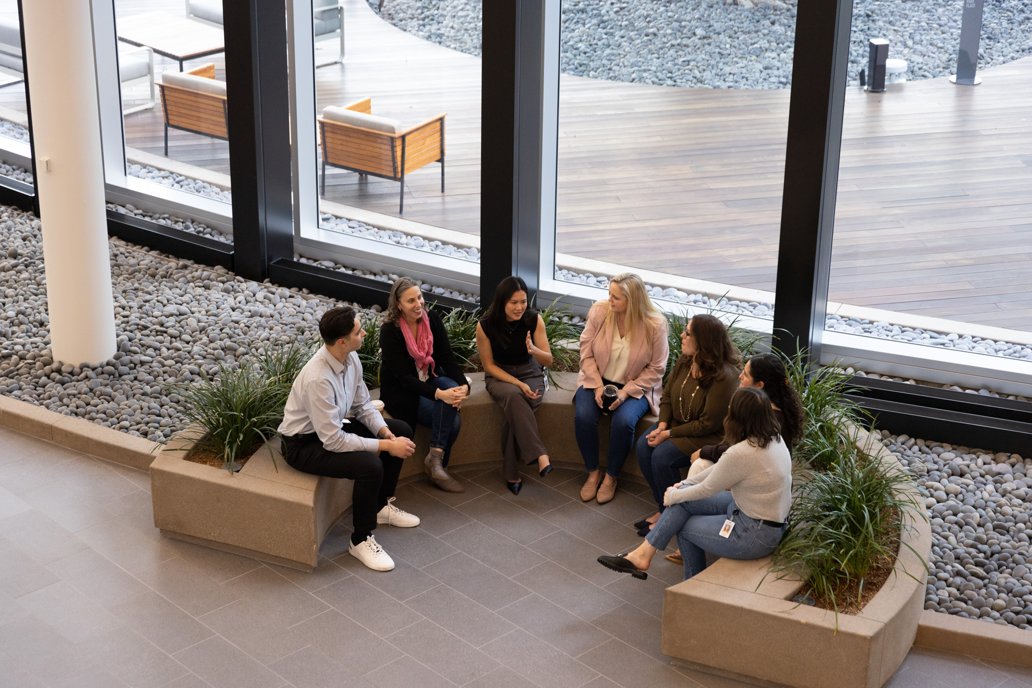 a group of people sitting in a circle