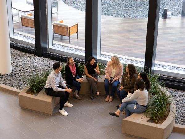 a group of people sitting in a circle