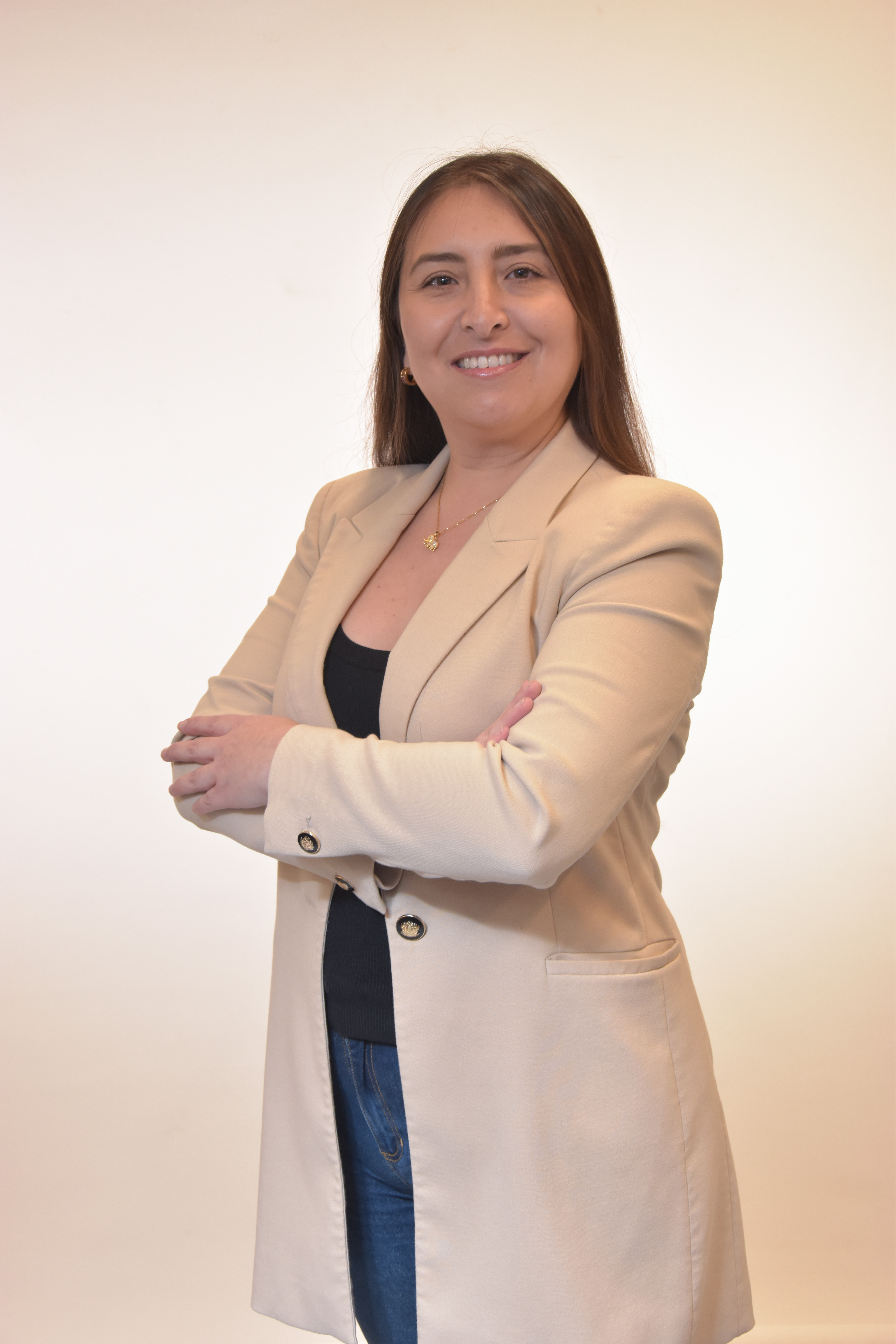 a person in a beige jacket