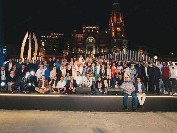 a group of people posing for a photo