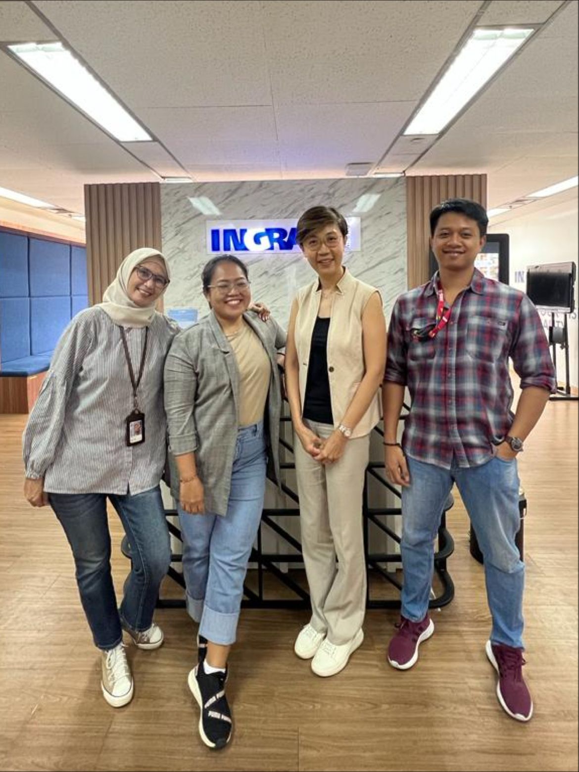 a group of people posing for a photo