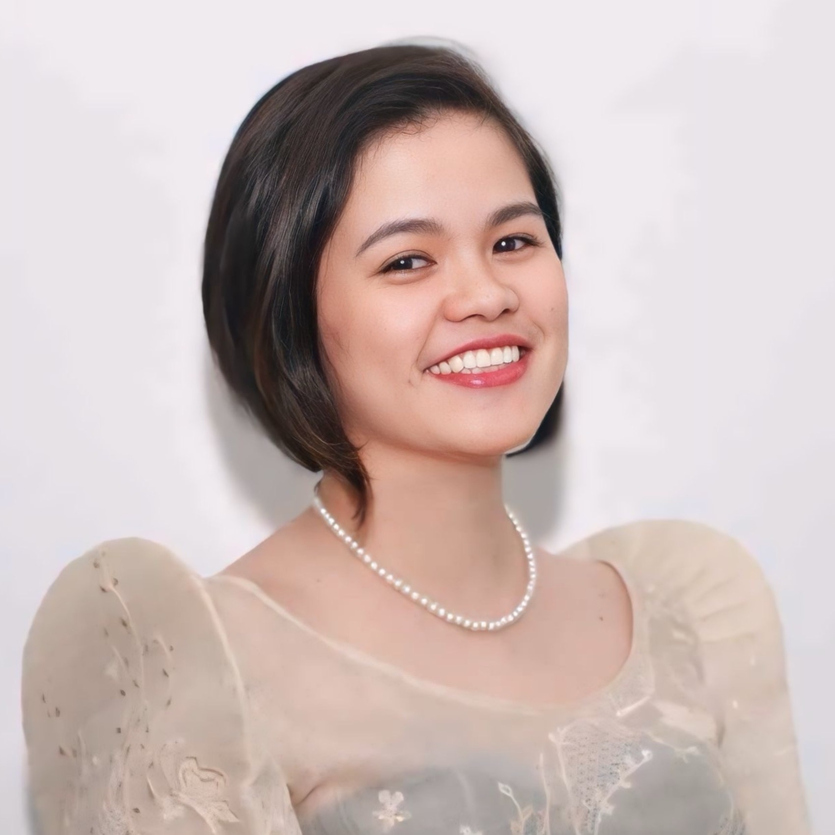 a person smiling at the camera