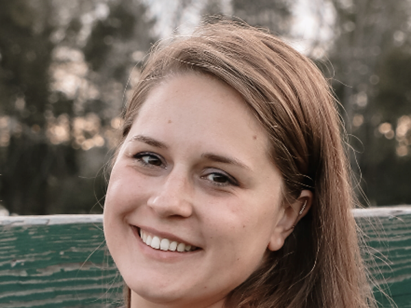 a person smiling at camera