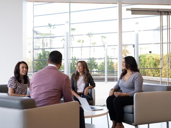 a group of people sitting in chairs