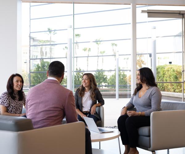 a group of people sitting in chairs