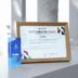 a frame and a blue book on a table