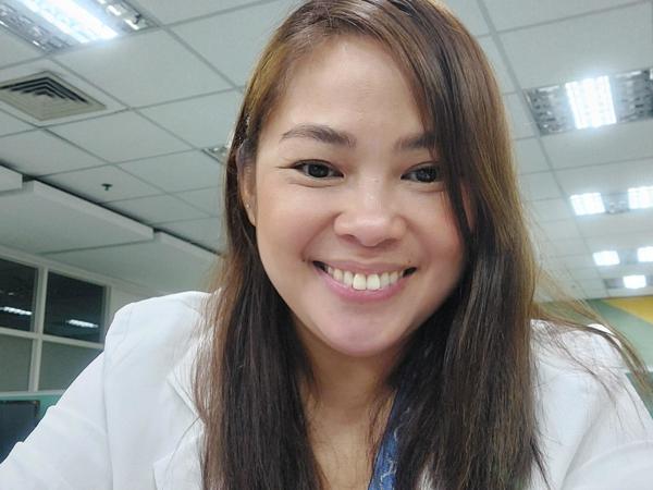 a person smiling at camera
