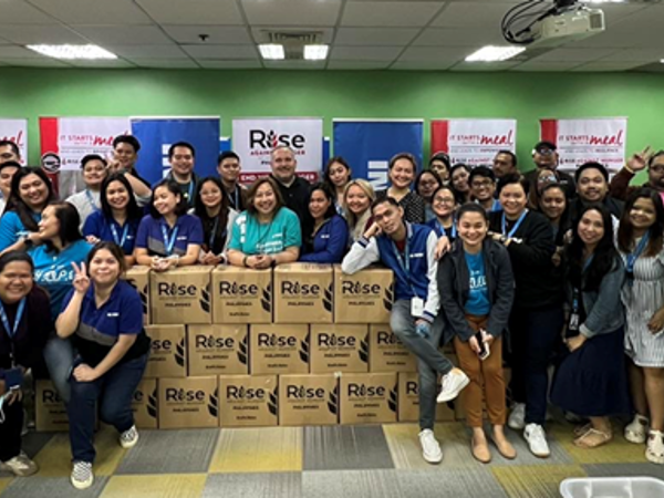 a group of people posing for a photo